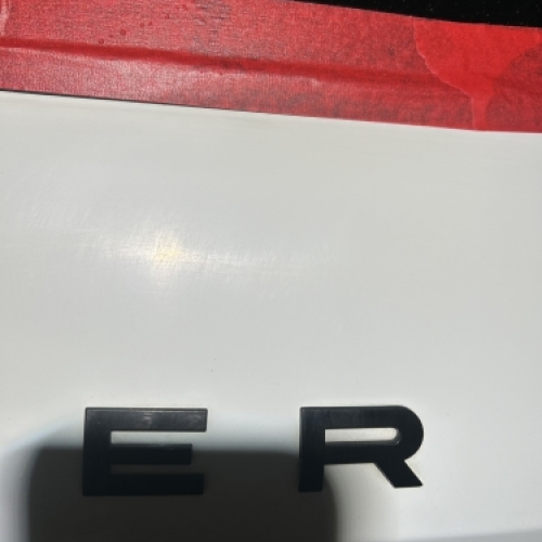 Range Rover bagklap før polering i Horsens med vaskeridser i lakken