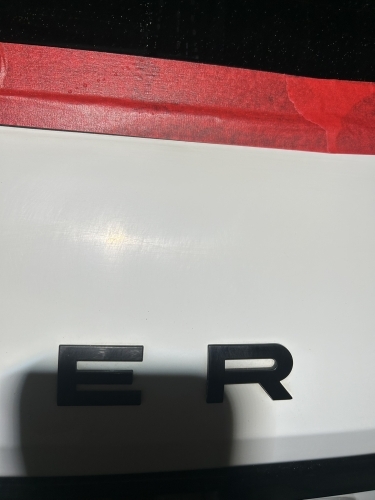 Range Rover bagklap før polering i Horsens med vaskeridser i lakken